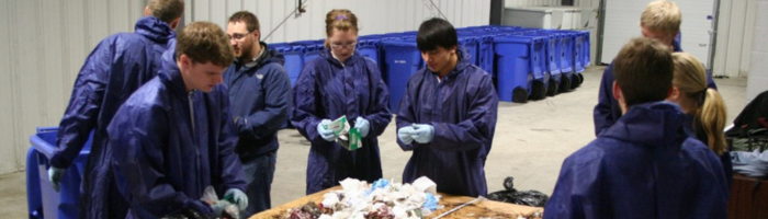 Group of students conducting a waste audit.