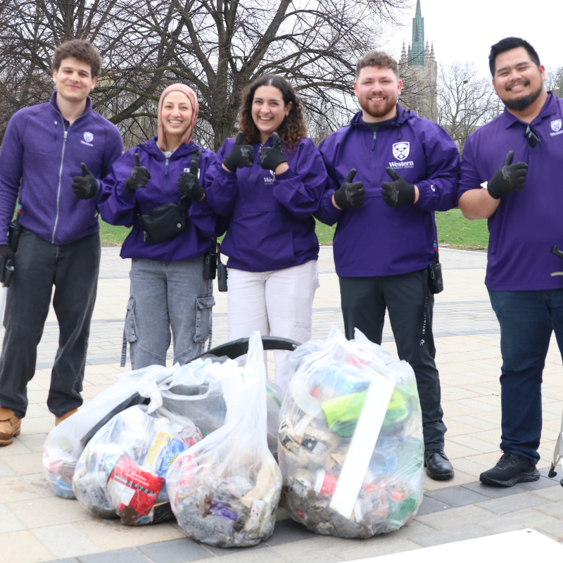 Group of people outside after a campus clean-up