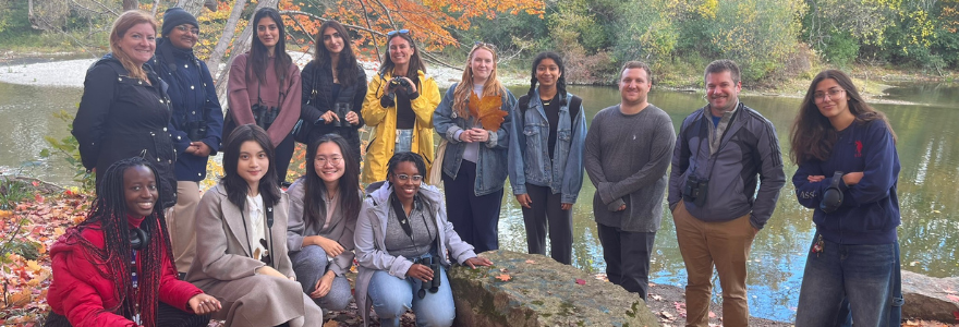 Group of people standing outside in the fall