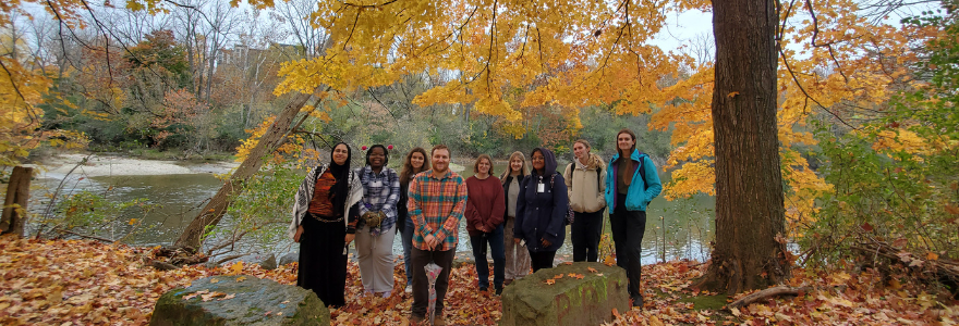 Group photo outside by the river