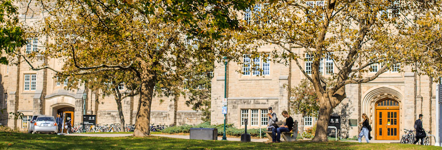 North campus in warm weather with people walking and sitting
